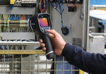 Electrical panel inspection using a meter.